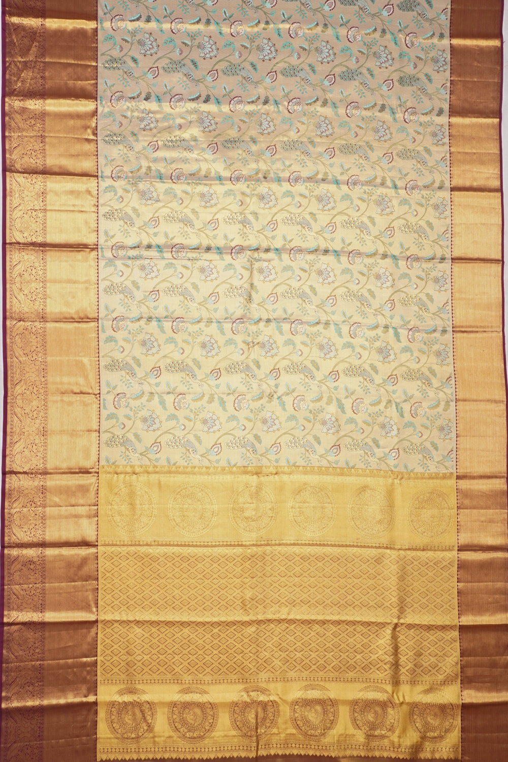 Taranga Kanchi Silk Tissue Brocade Cream Saree
