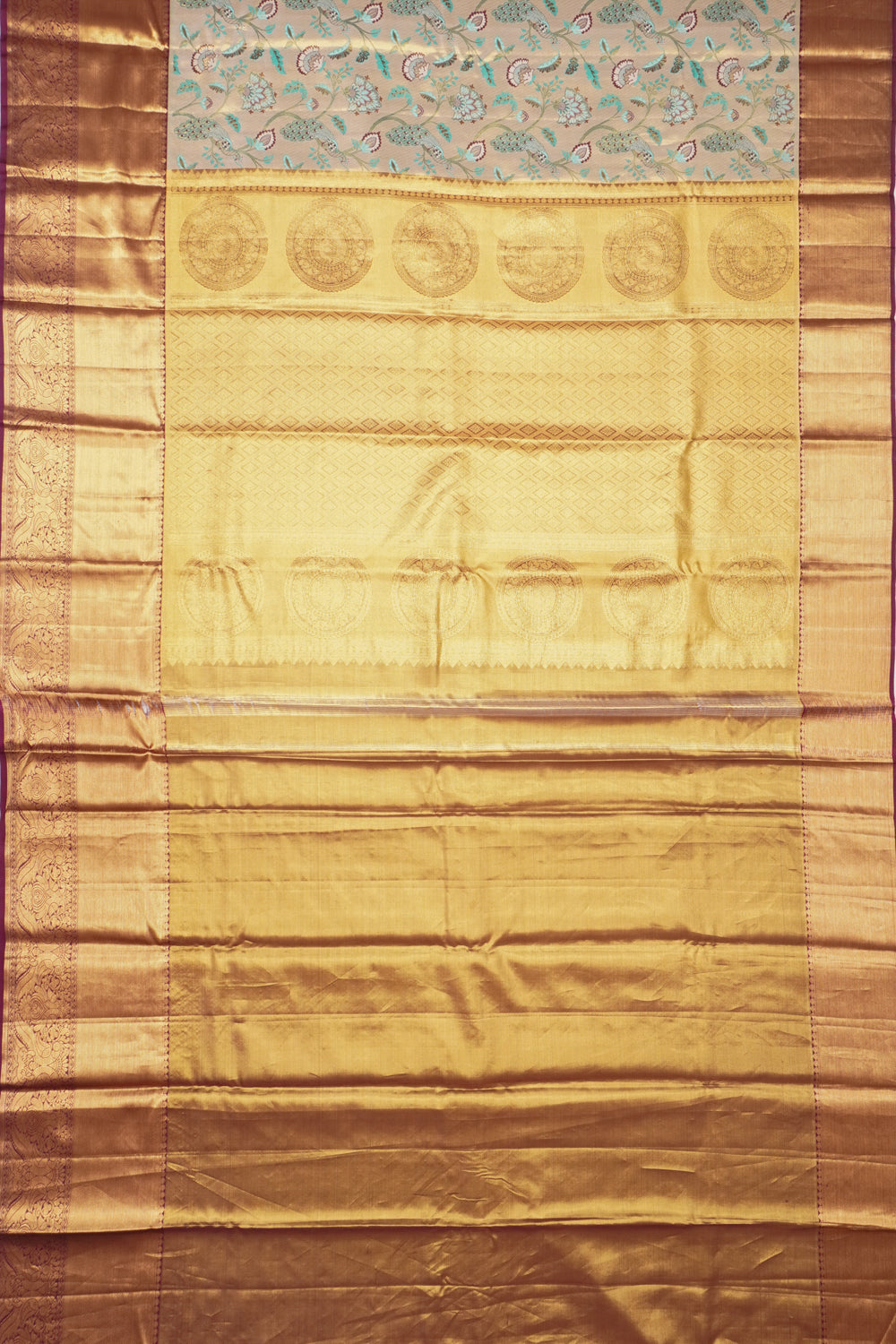 Taranga Kanchi Silk Tissue Brocade Cream Saree