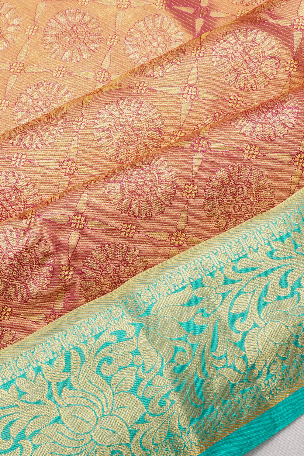 Taranga Kanchi Silk Tissue Brocade Pastel Pink Saree