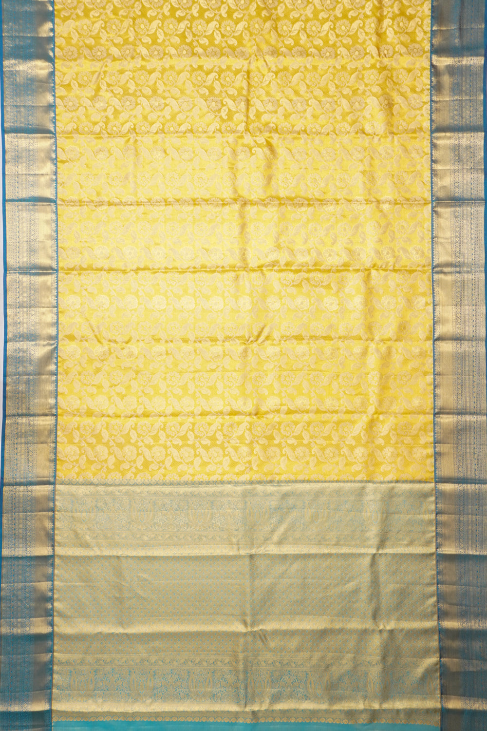 Taranga Kanchi Silk Tissue Brocade Gold Saree