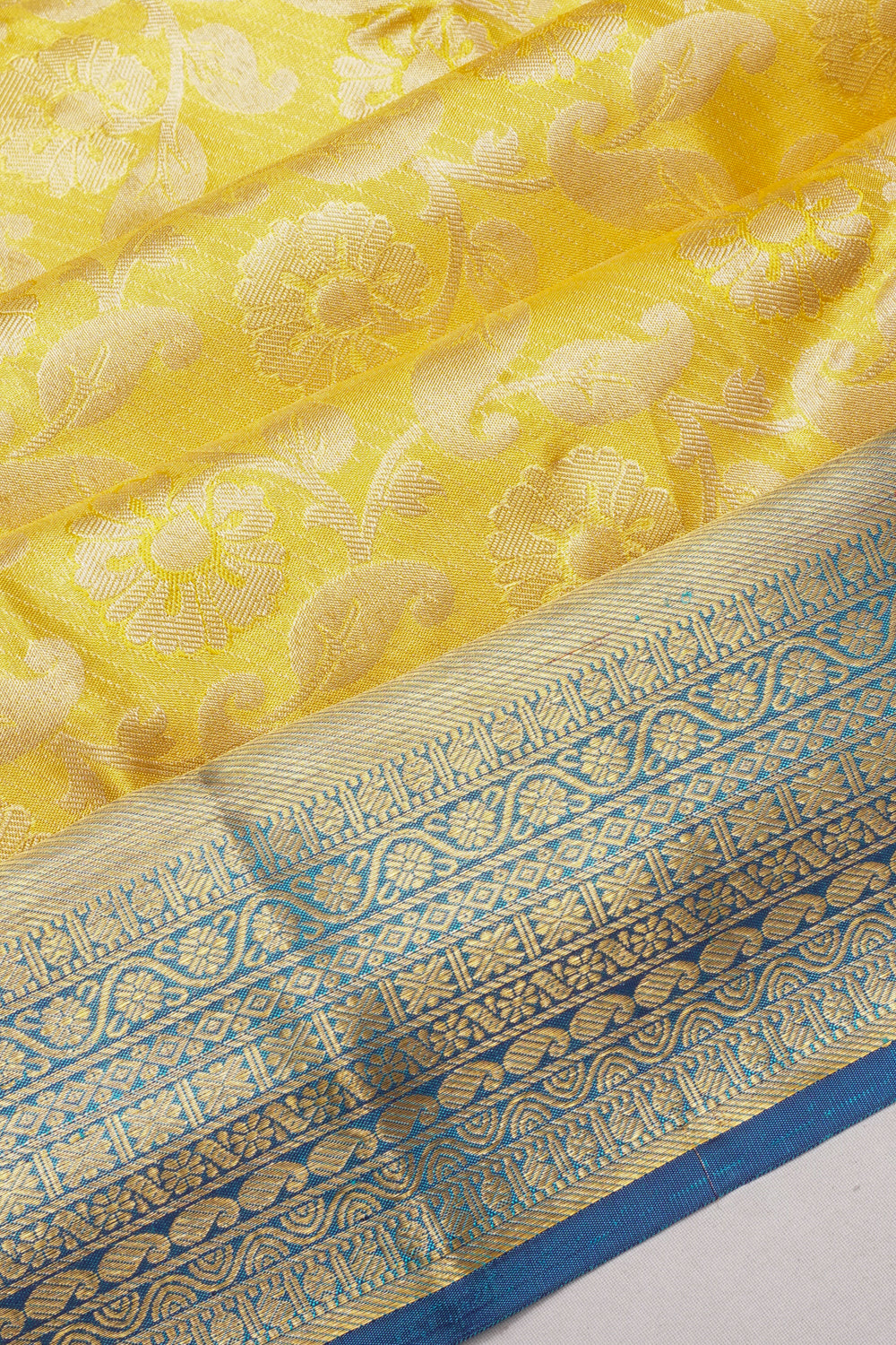 Taranga Kanchi Silk Tissue Brocade Gold Saree