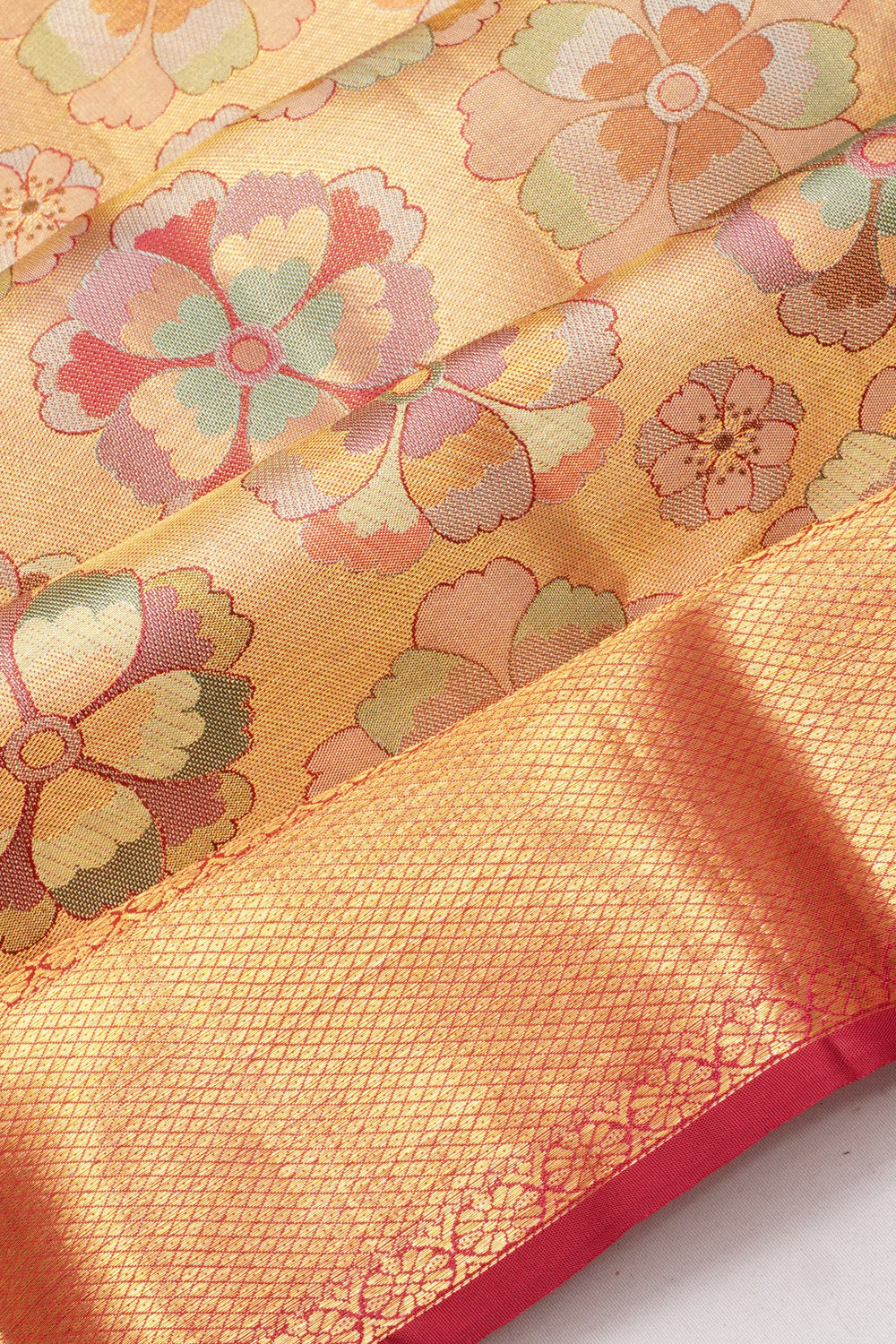 Taranga Kanchi Silk Tissue Brocade Gold Saree