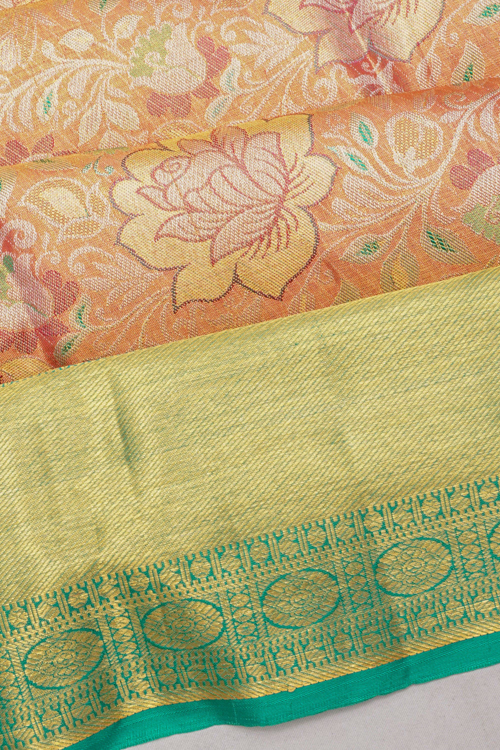 Taranga Kanchi Silk Tissue Brocade Orange Saree