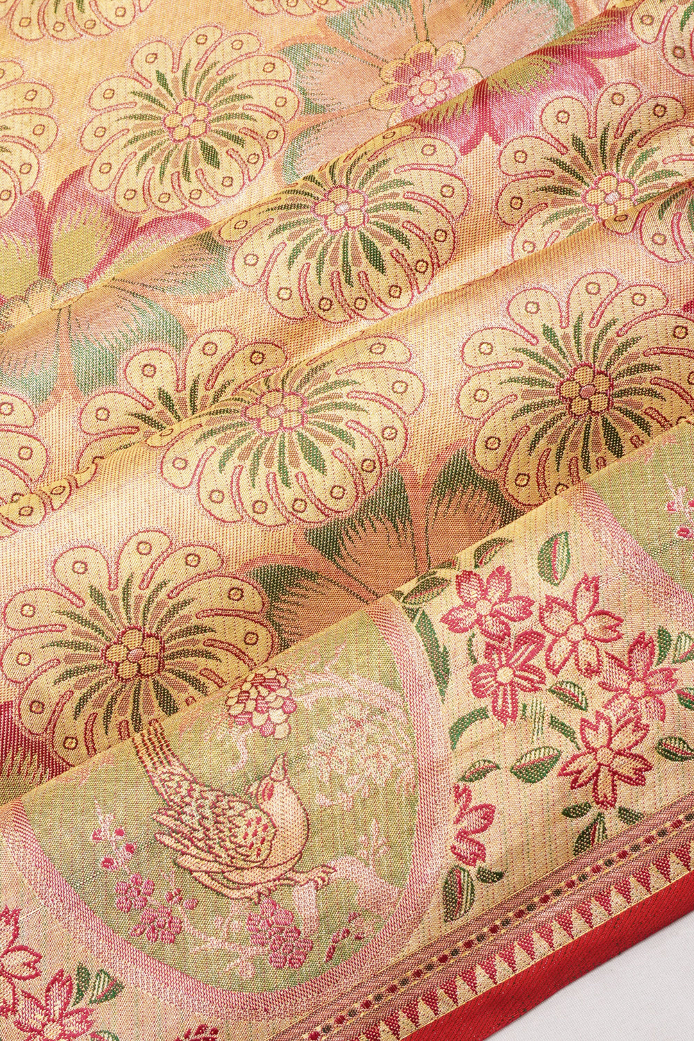 Taranga Kanchi Silk Tissue Brocade Gold Saree