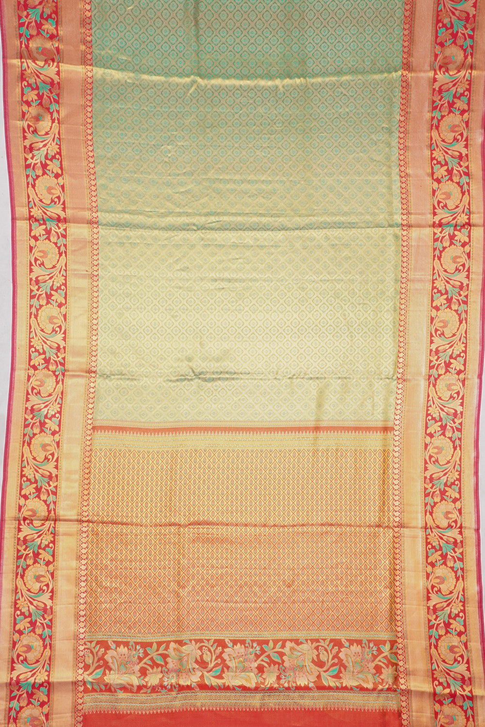 Taranga Kanchi Silk Tissue Brocade Green Saree
