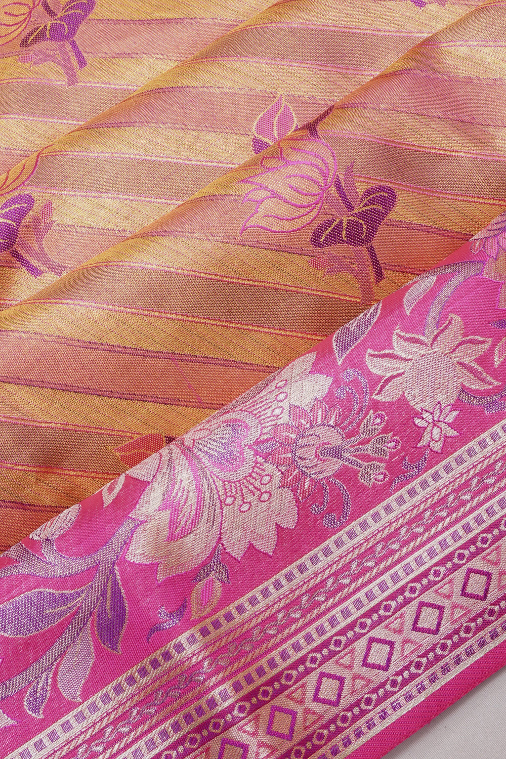 Taranga Kanchi Silk Tissue Lines Gold Saree