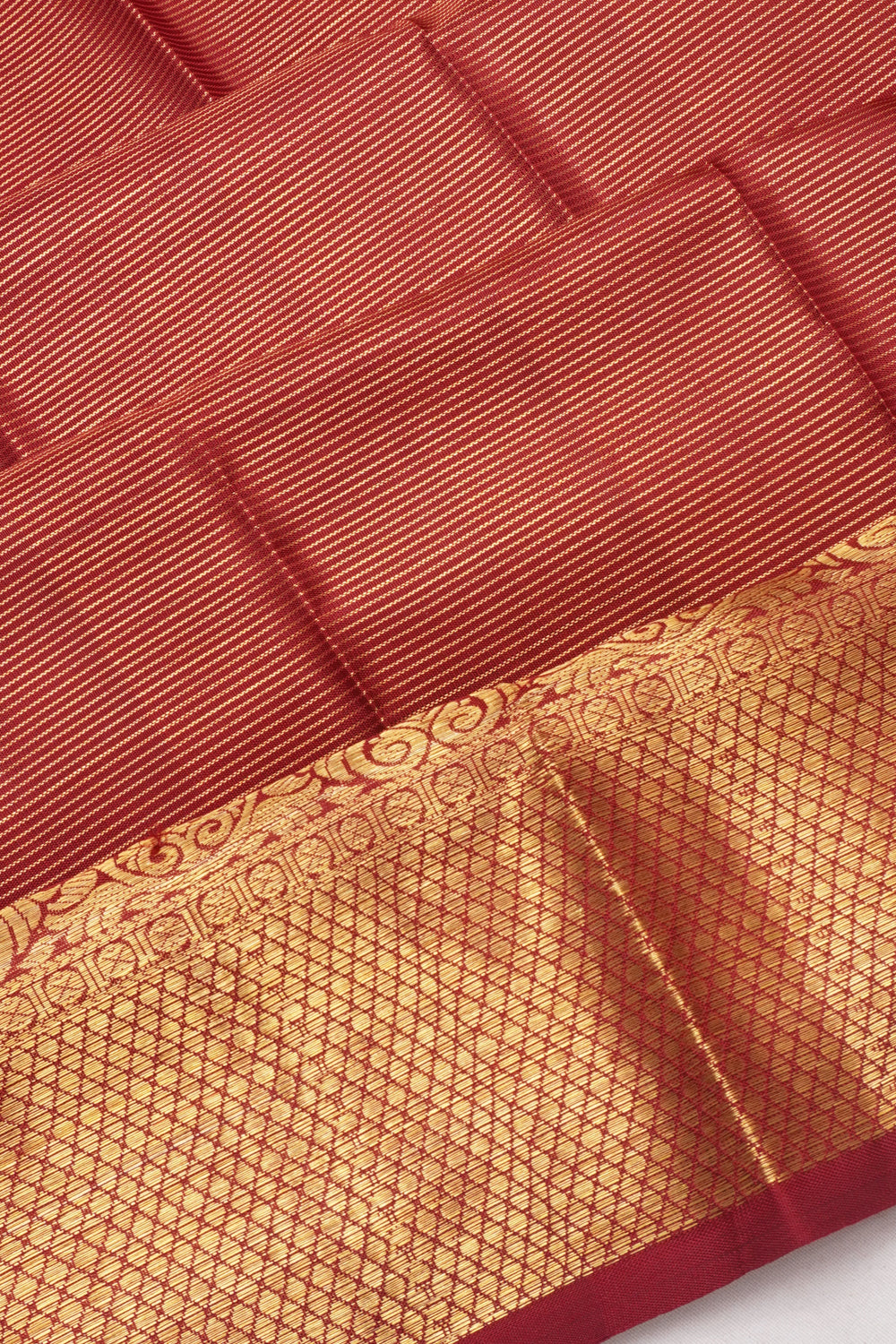Kanchipuram Silk Oosi Lines And Butta Burgundy Saree