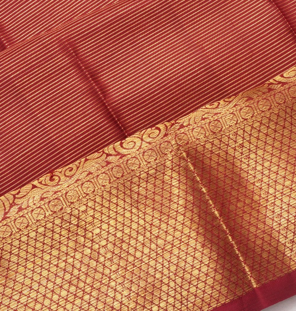 Kanchipuram Silk Oosi Lines And Butta Burgundy Saree