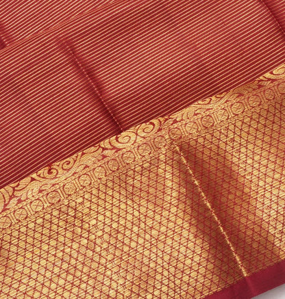 Kanchipuram Silk Oosi Lines And Butta Burgundy Saree