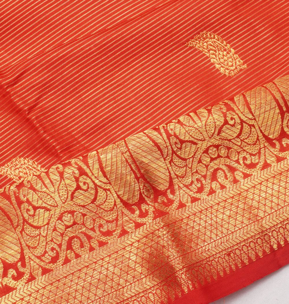 Kanchipuram SIlk Oosi Lines And Butta Red Saree