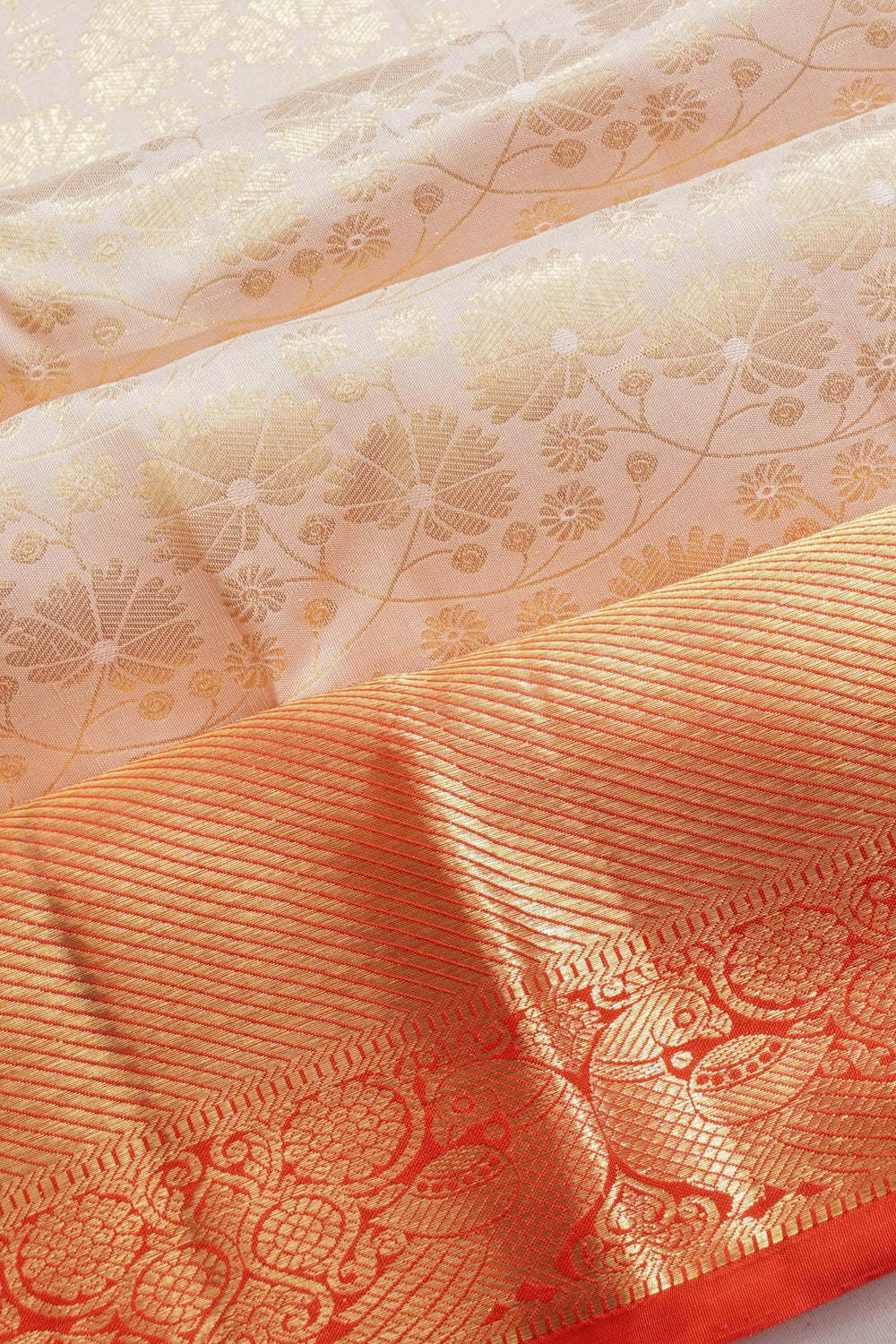 Taranga Kanchi Silk Brocade Cream Saree