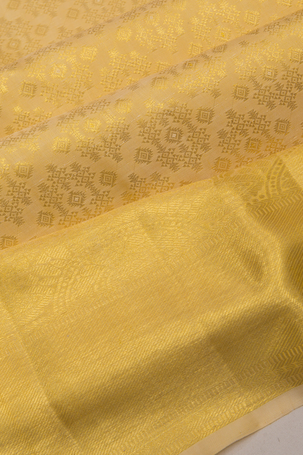 Taranga Kanchi Silk Tissue Cream Saree