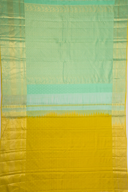 Taranga Kanchi Silk Brocade Butta Green Saree