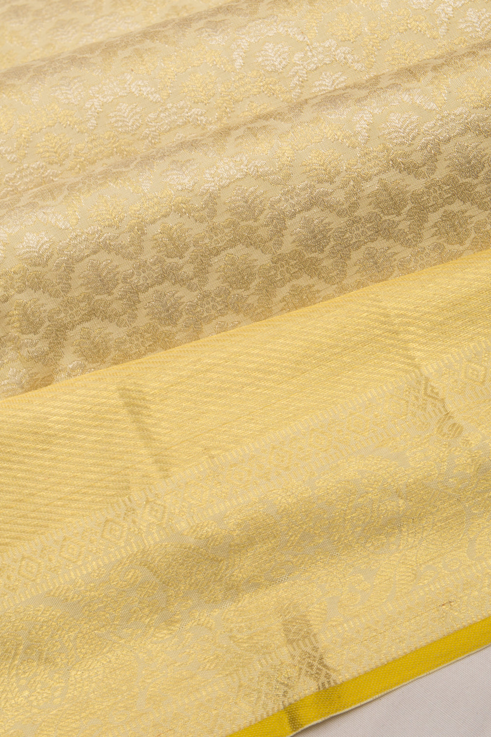 Taranga Kanchi Silk Brocade Butta Pastel Yellow Saree