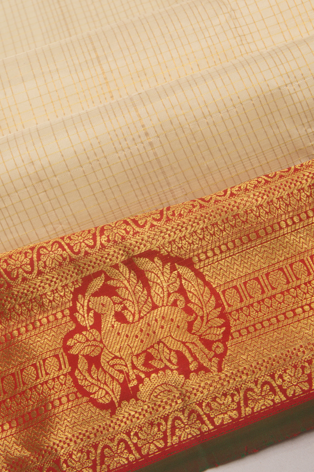 Kanchipuram Silk Checks and Butta Cream Saree