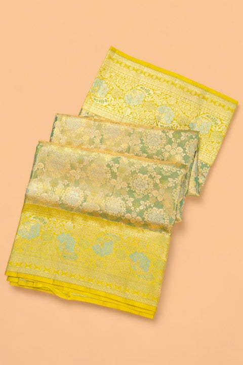 Taranga Kanchi Silk Tissue Brocade Green Saree