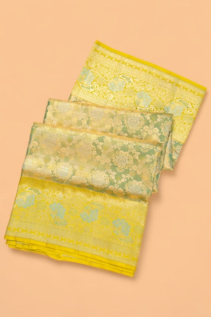 Taranga Kanchi Silk Tissue Brocade Green Saree