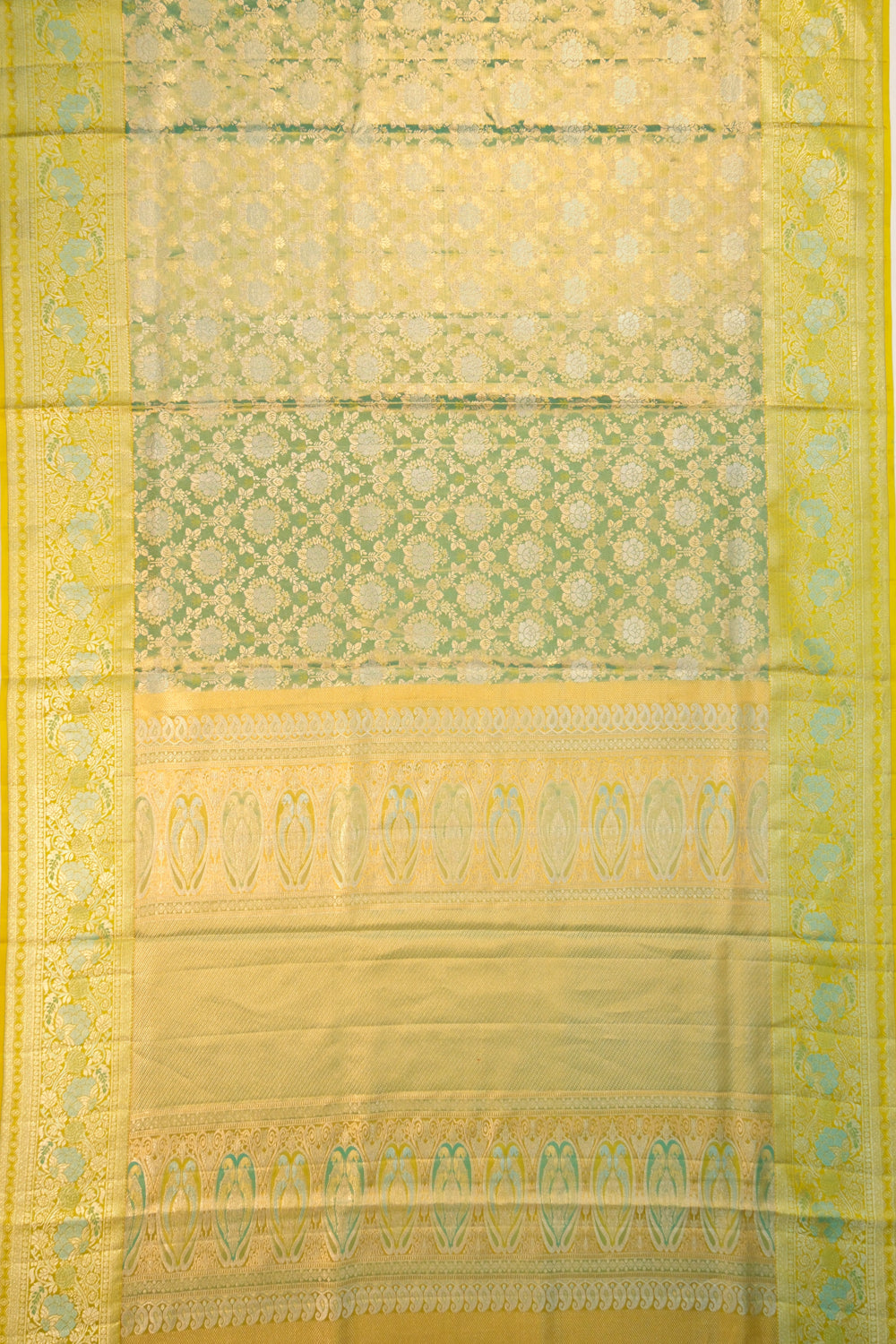 Taranga Kanchi Silk Tissue Brocade Green Saree