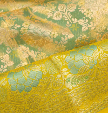 Taranga Kanchi Silk Tissue Brocade Green Saree