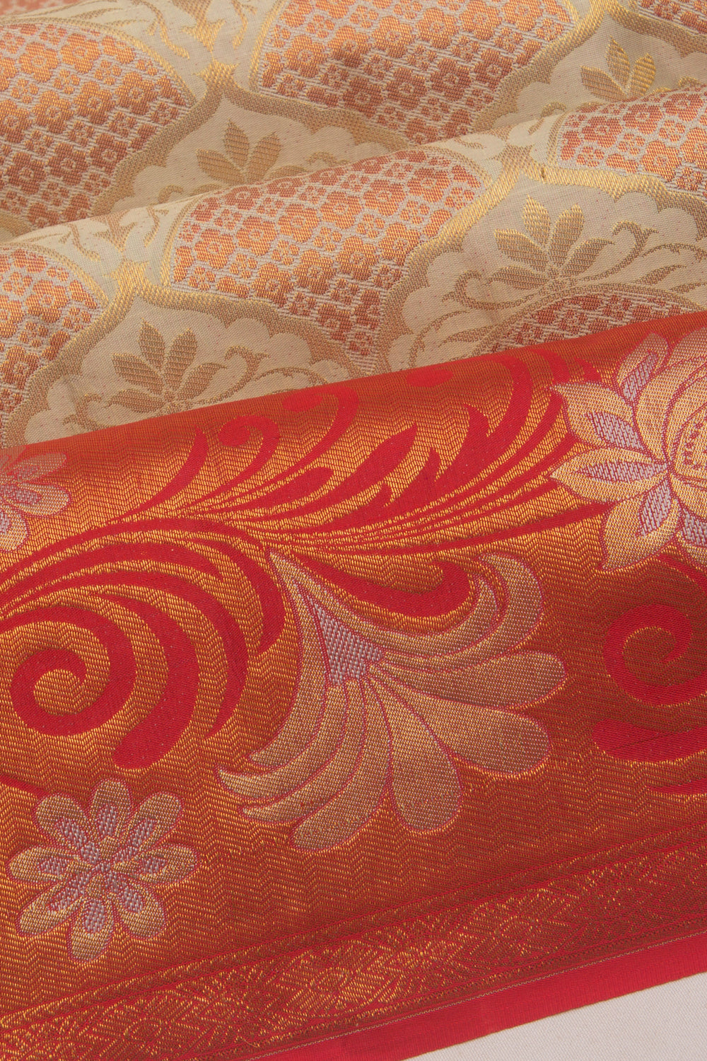 Taranga Kanchi Silk Tissue Brocade Cream Saree