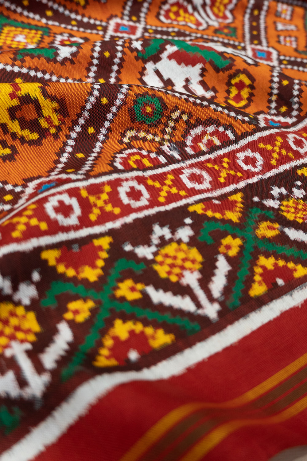 Patan Patola Silk Double Ikat 9 Figure Orange Saree
