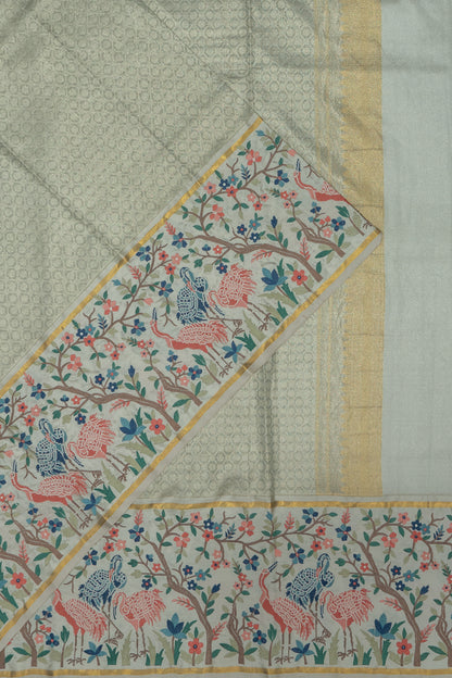 Kanchipuram Silk Tissue Criss Cross Checks And Butta Off White Saree With Embroidery Border