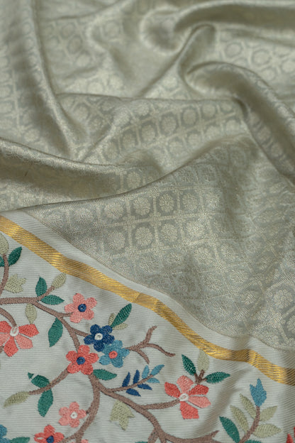 Kanchipuram Silk Tissue Criss Cross Checks And Butta Off White Saree With Embroidery Border