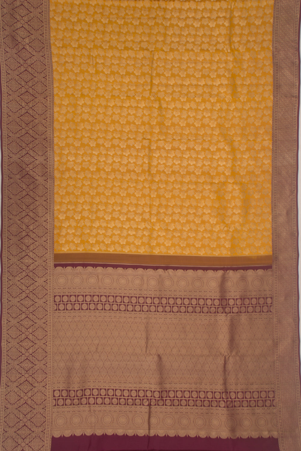 Taranga Kanchi Silk Tissue Jaal Yellow Saree