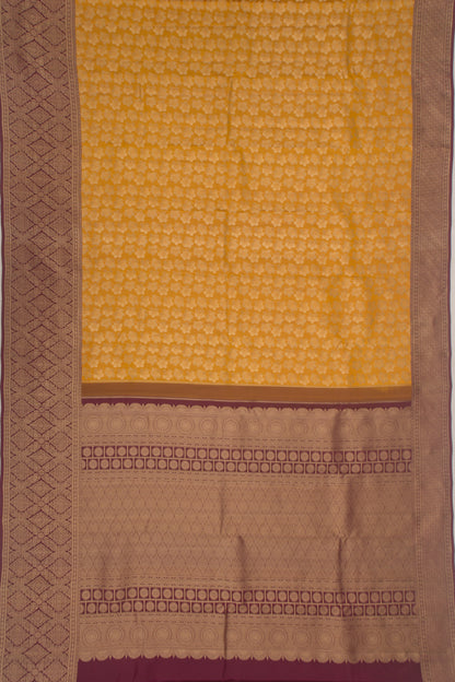 Taranga Kanchi Silk Tissue Jaal Yellow Saree