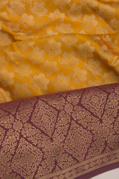 Taranga Kanchi Silk Tissue Jaal Yellow Saree