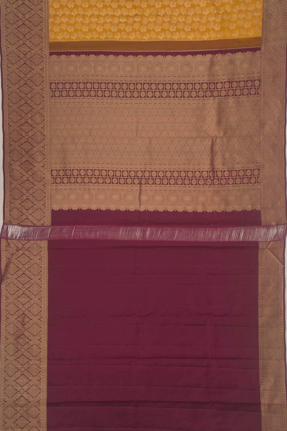 Taranga Kanchi Silk Tissue Jaal Yellow Saree