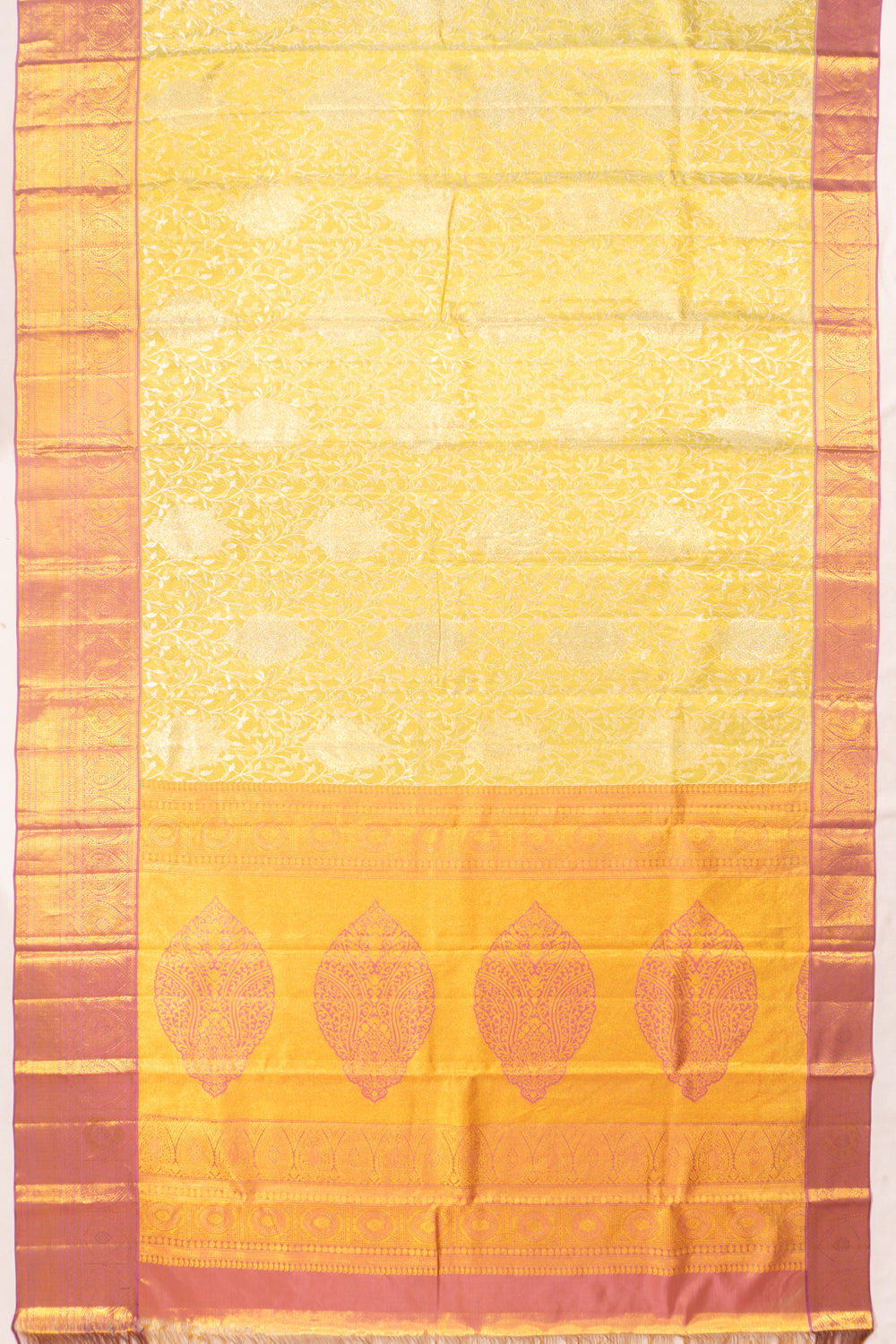 Taranga Kanchi Silk Tissue Jaal Yellow Saree