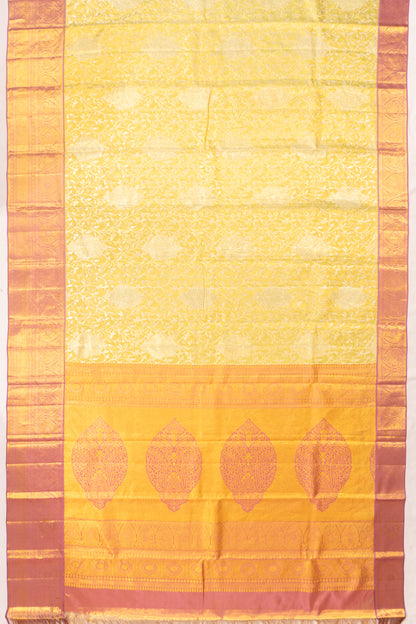 Taranga Kanchi Silk Tissue Jaal Yellow Saree