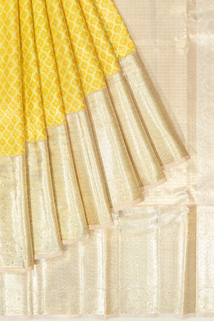 Kanchipuram Silk Tissue Jaal And Butta Yellow Saree