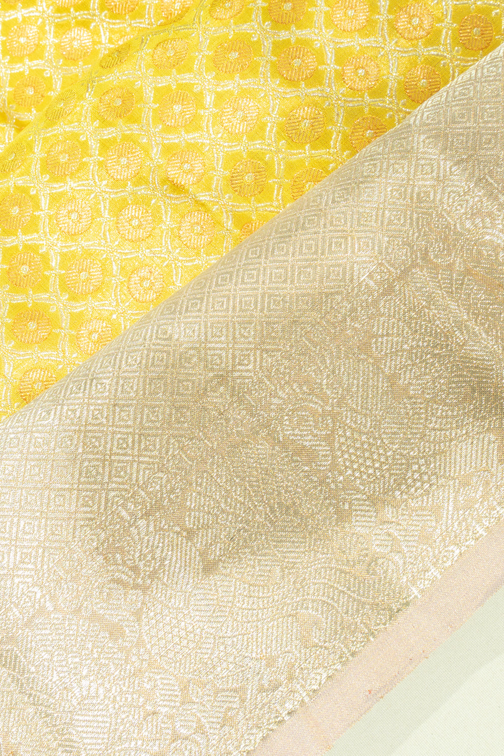 Kanchipuram Silk Tissue Jaal And Butta Yellow Saree
