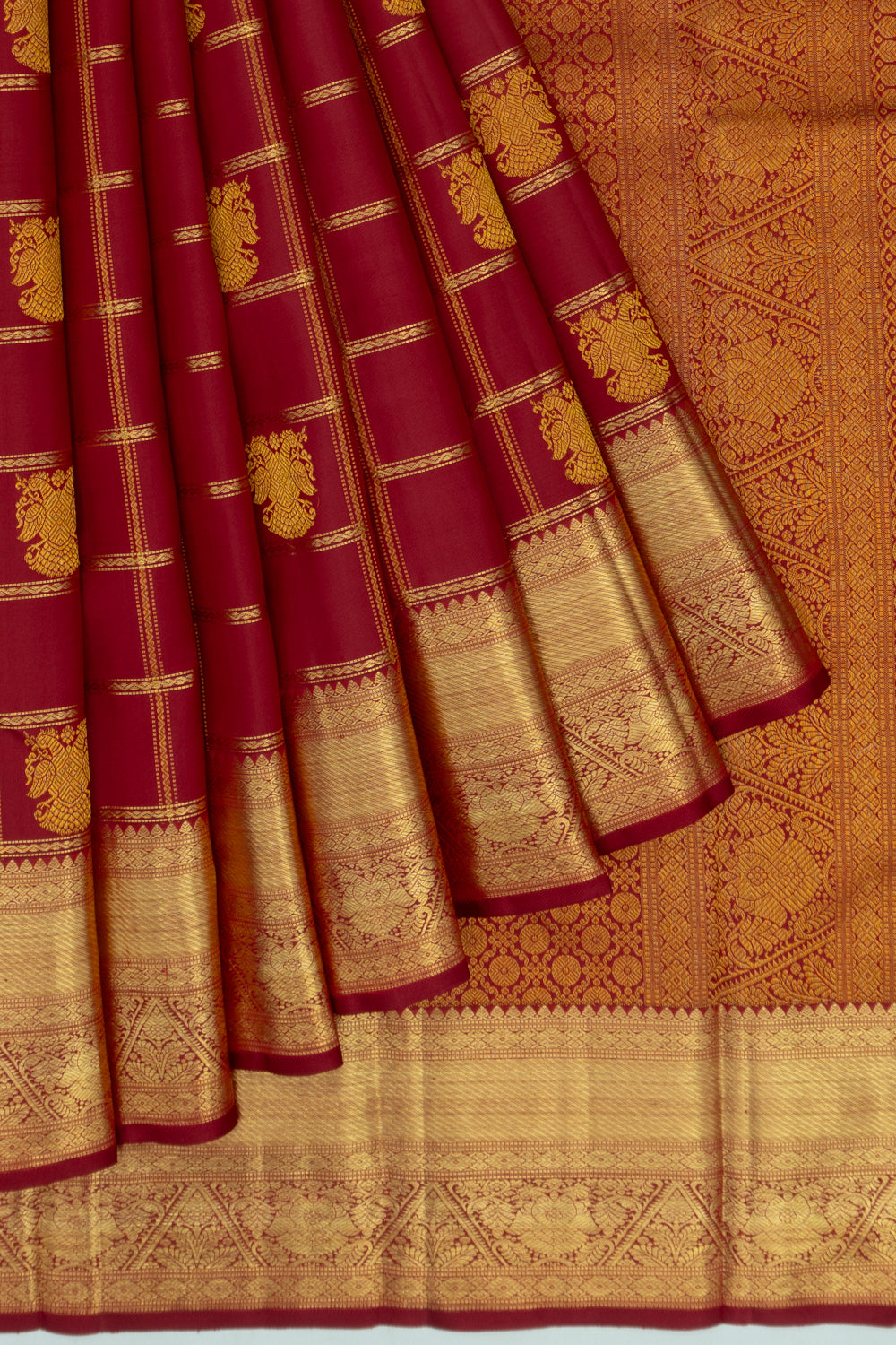 Kanchipuram Silk Checks And Butta Maroon Saree
