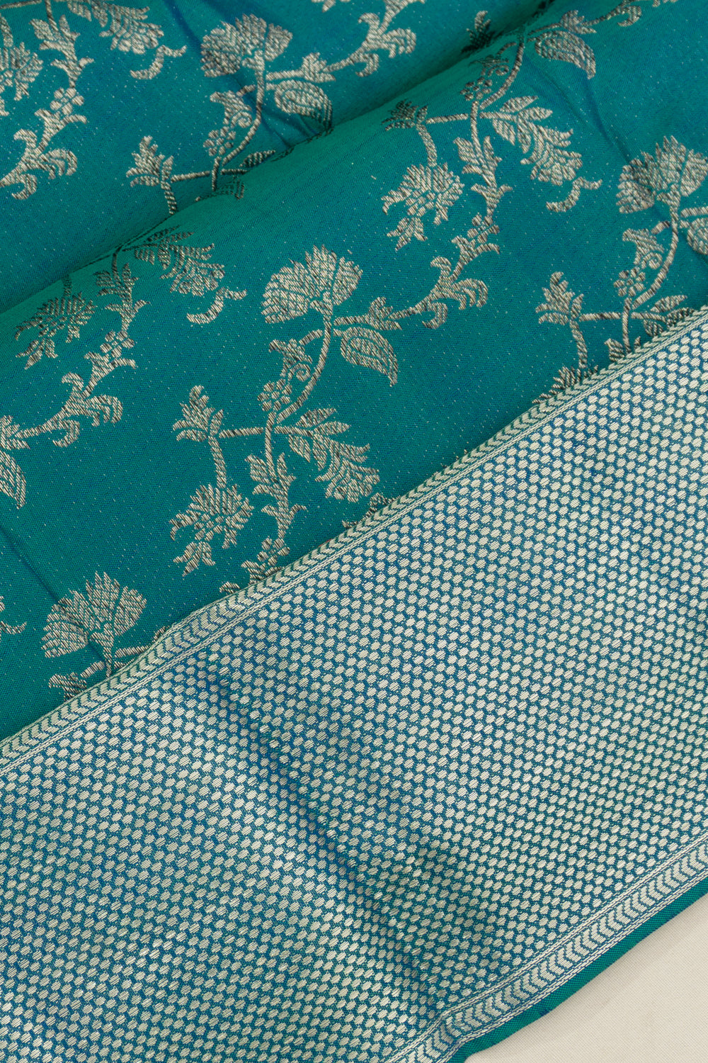 Kanchipuram Silk Jaal Teal Blue Saree