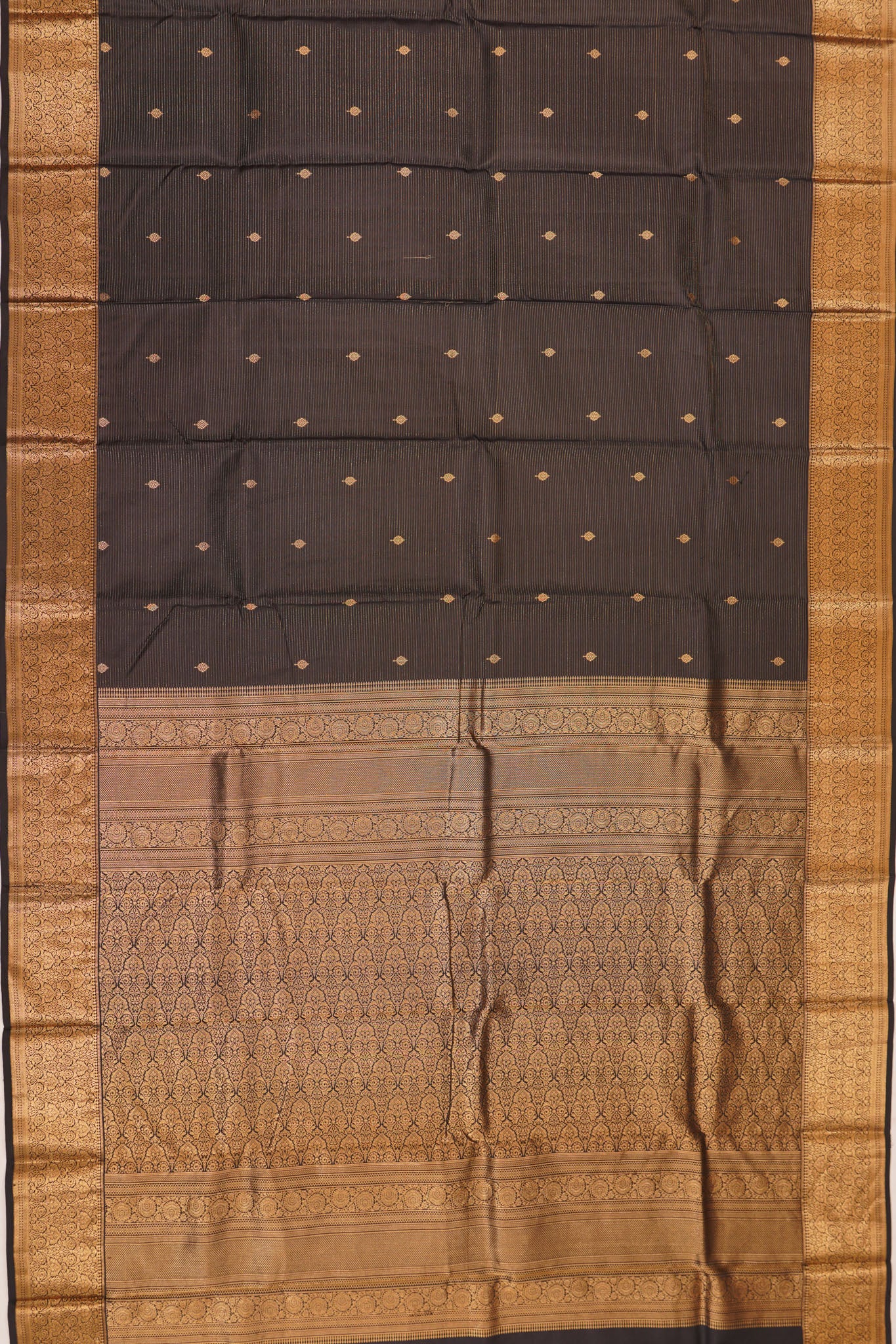 Taranga Kanchi Silk Oosi Lines And Butta Black Saree