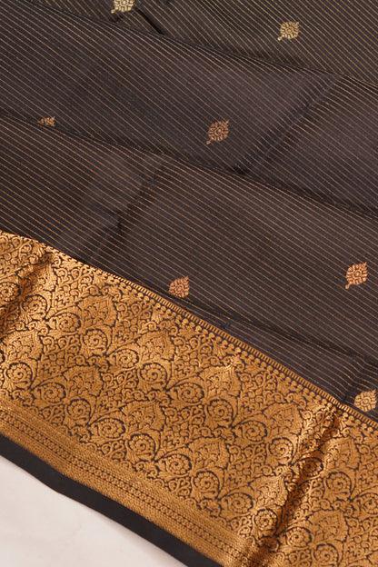 Taranga Kanchi Silk Oosi Lines And Butta Black Saree