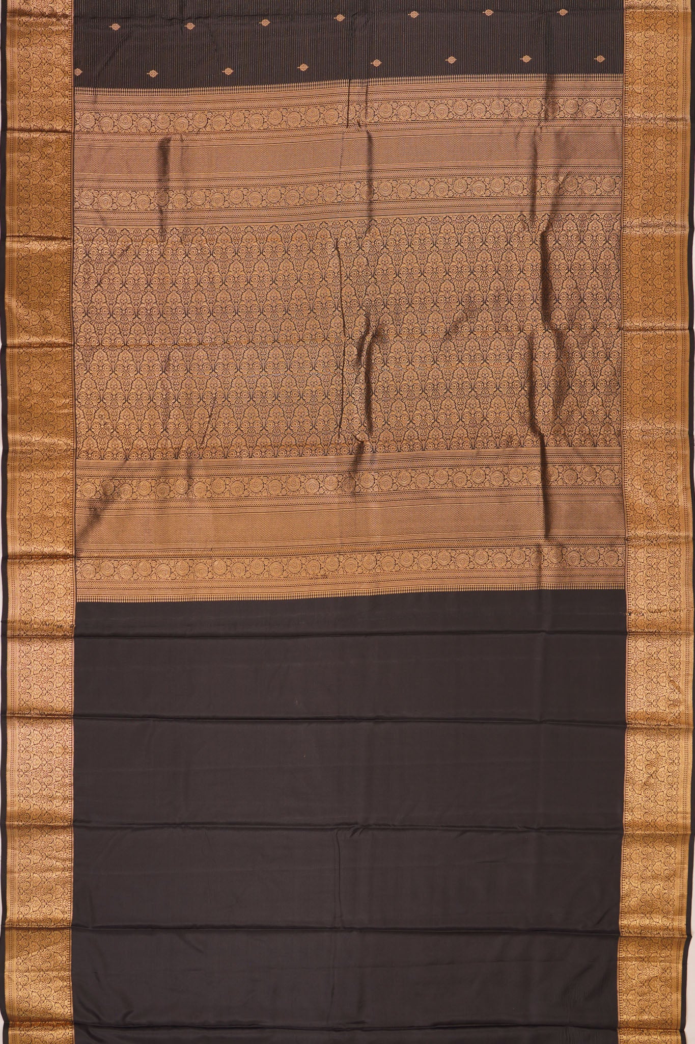 Taranga Kanchi Silk Oosi Lines And Butta Black Saree