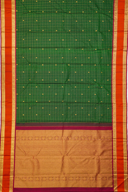 Kanchipuram Silk Checks And Butta Bottle Green Saree