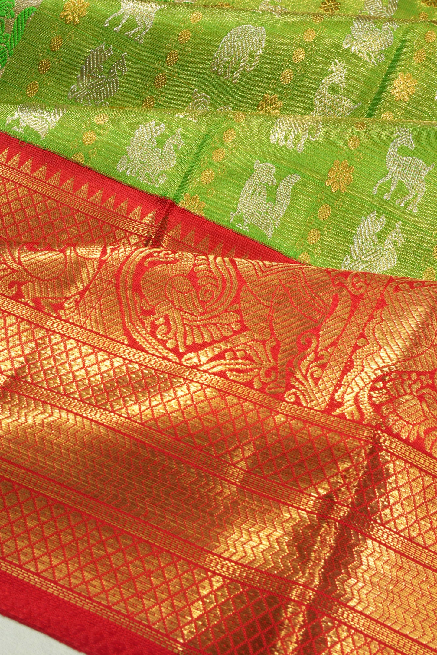 Kanchipuram Silk Tissue Vertical Lines And Butta Parrot Green Saree