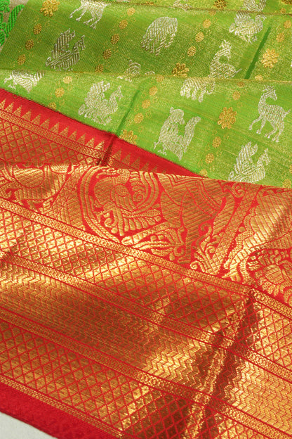 Kanchipuram Silk Tissue Vertical Lines And Butta Parrot Green Saree