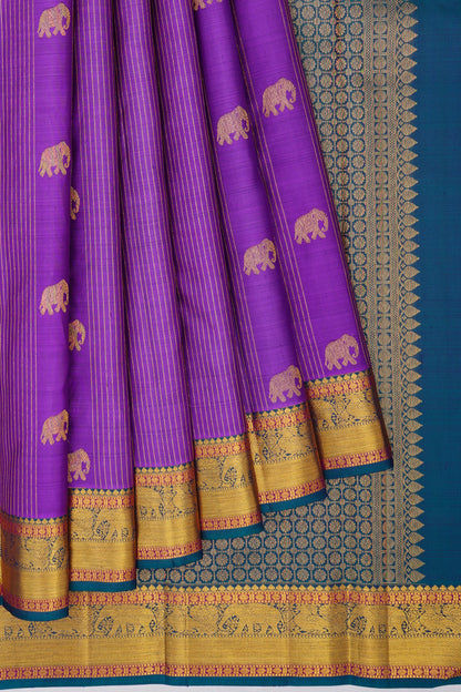 Kanchipuram Silk Lines And Yaani Butta Purple Saree