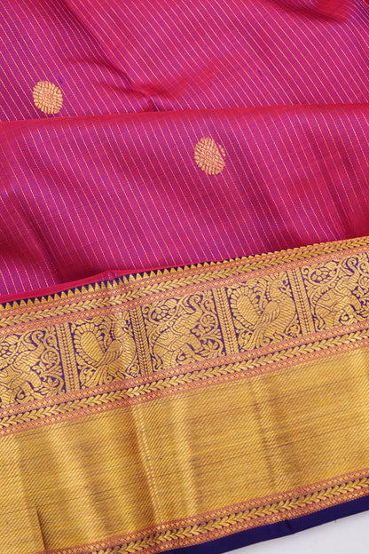 Kanchipuram Silk Vertical Lines And Butta Purple Saree