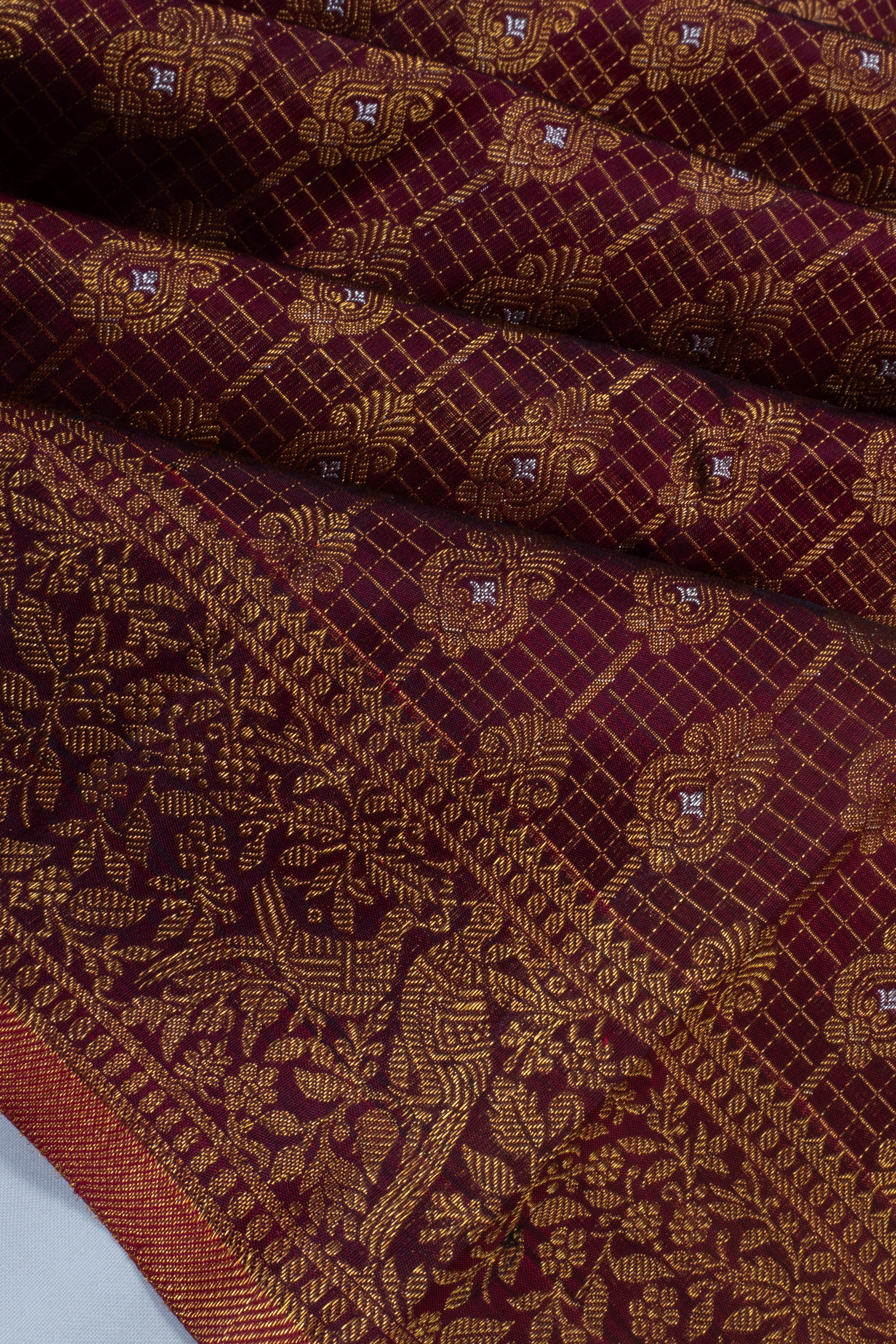 Kanchipuram Silk Checks And Brocade Burgundy Saree