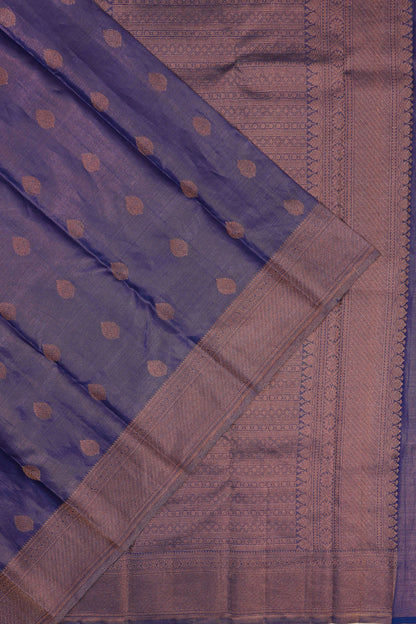 Taranga Kanchi Silk Tissue Oosi Lines And Butta Blue Saree