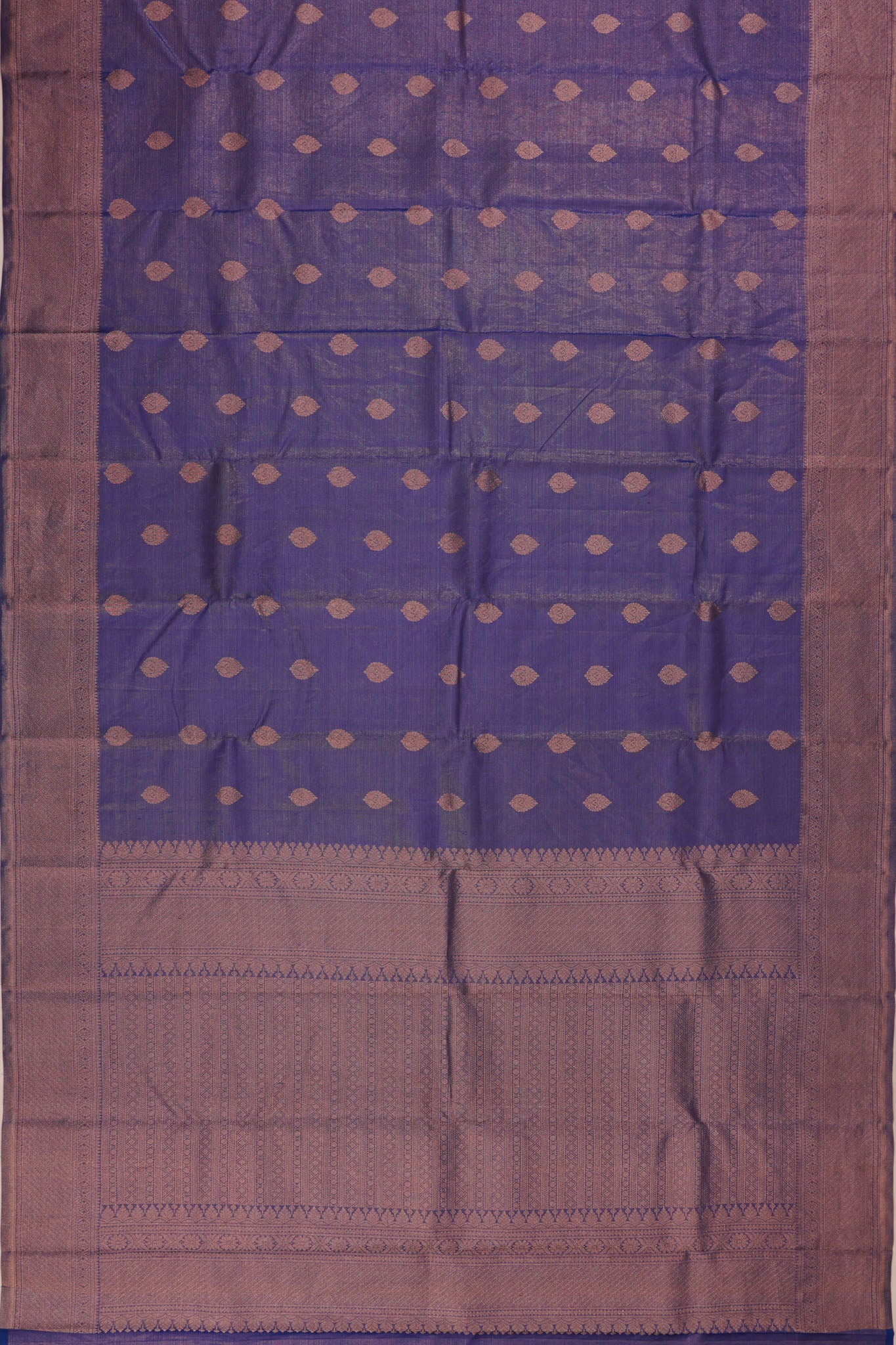 Taranga Kanchi Silk Tissue Oosi Lines And Butta Blue Saree