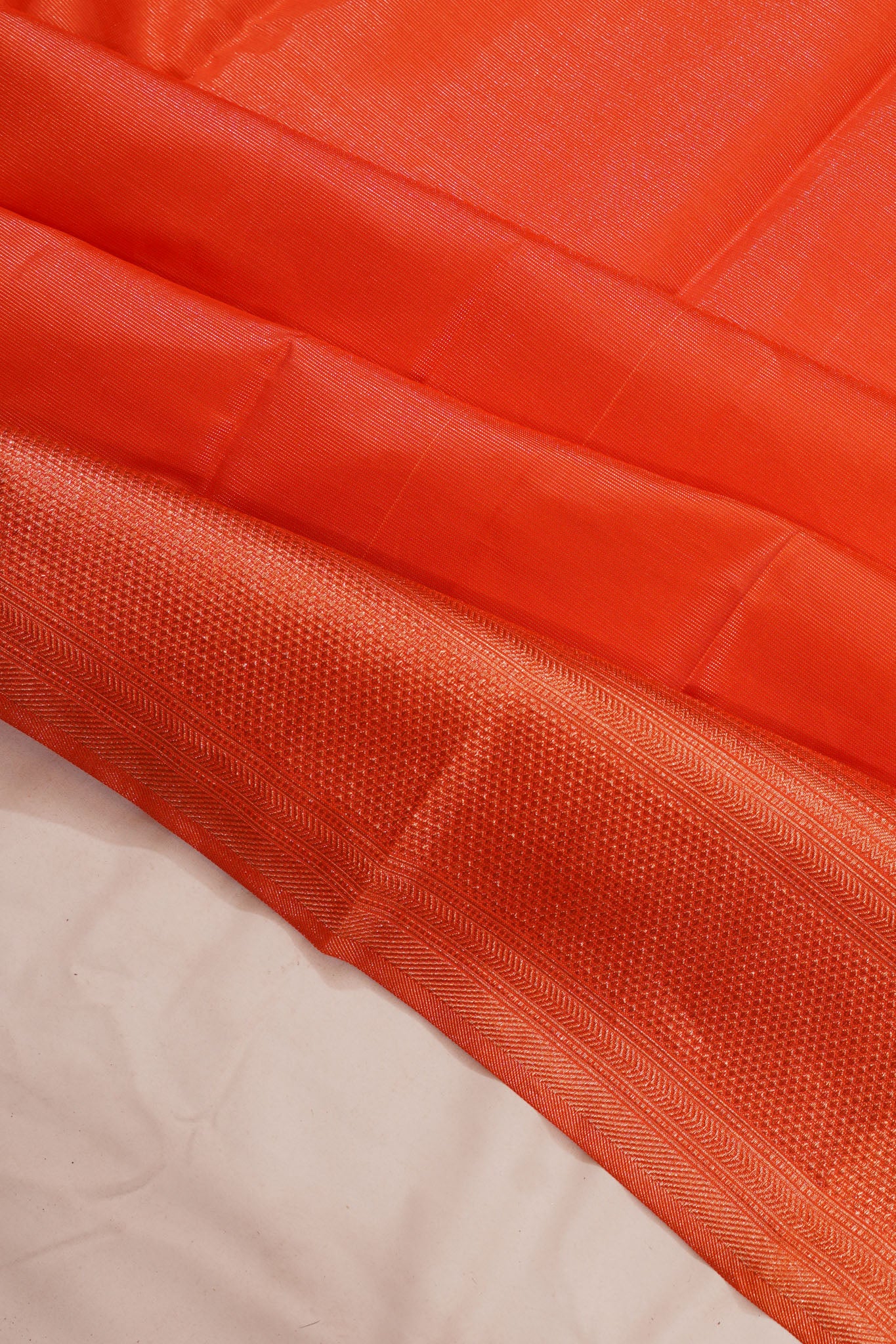 Taranga Kanchi Silk Tissue Oosi Lines Orange Saree
