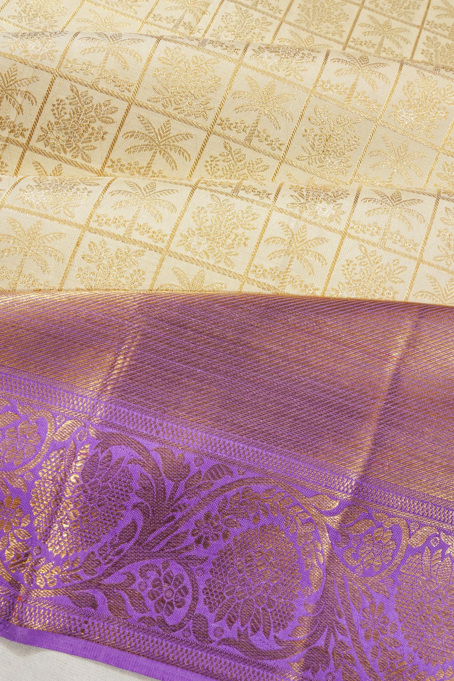 Kanchipuram Silk Checks And Butta Cream saree